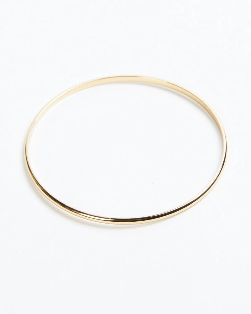Front of a size O/S Skinny Stella Bangle Bracelet in Gold in Gold by Eklexic. | dia_product_style_image_id:345047